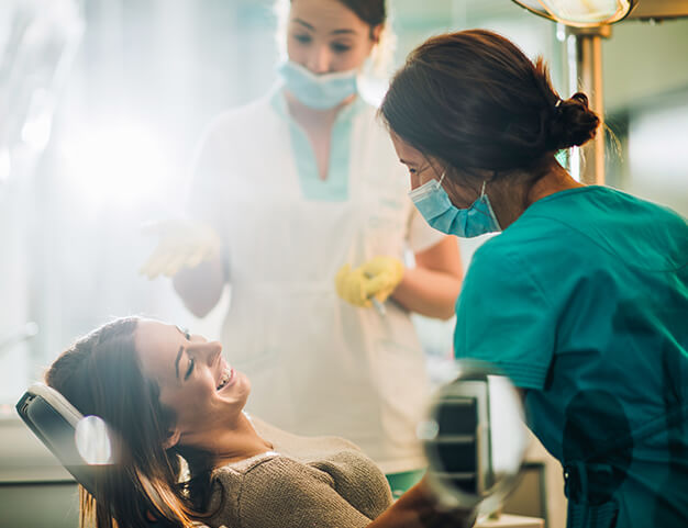 dentist talking with a patient