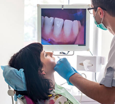 dentist examining a patient's teeth